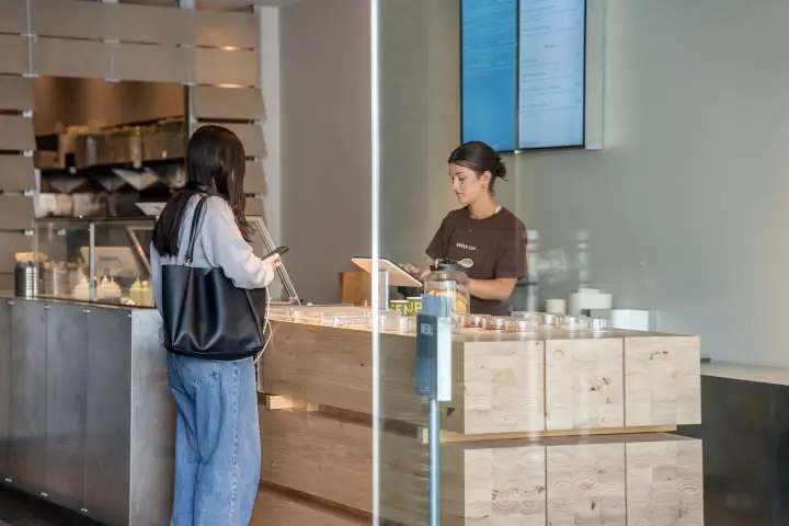 Green Cup customer at checkout