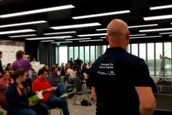 Chief Growth Officer Aaron O'Keeffe welcoming the Aussie Broadband and formerly Over the Wire teams at our 2022 Annual Town Hall.